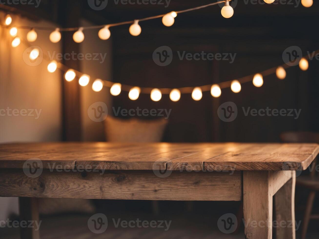 Rustic Wooden Table with String Lights Background. photo