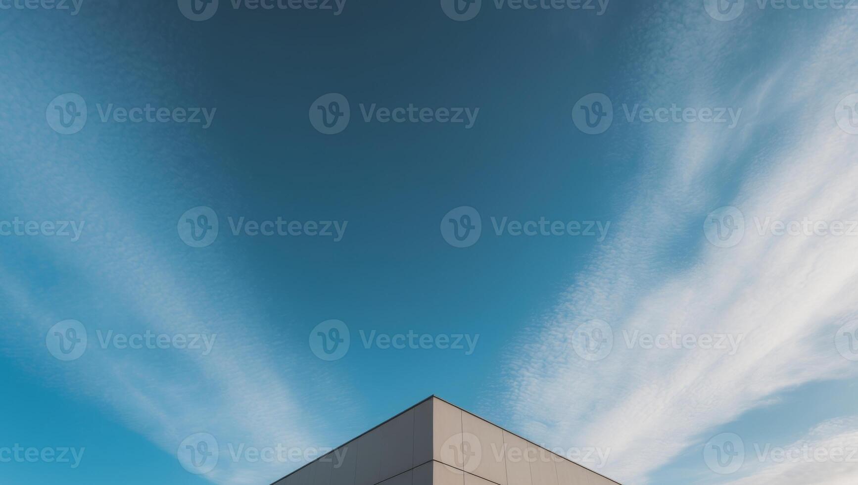 a building with a blue sky and a building with a sky background. photo