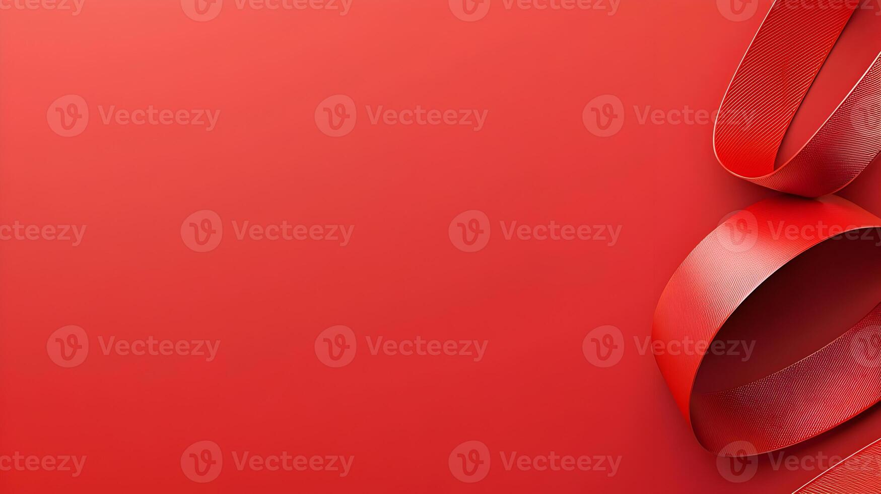 A red ribbon is on a red background photo