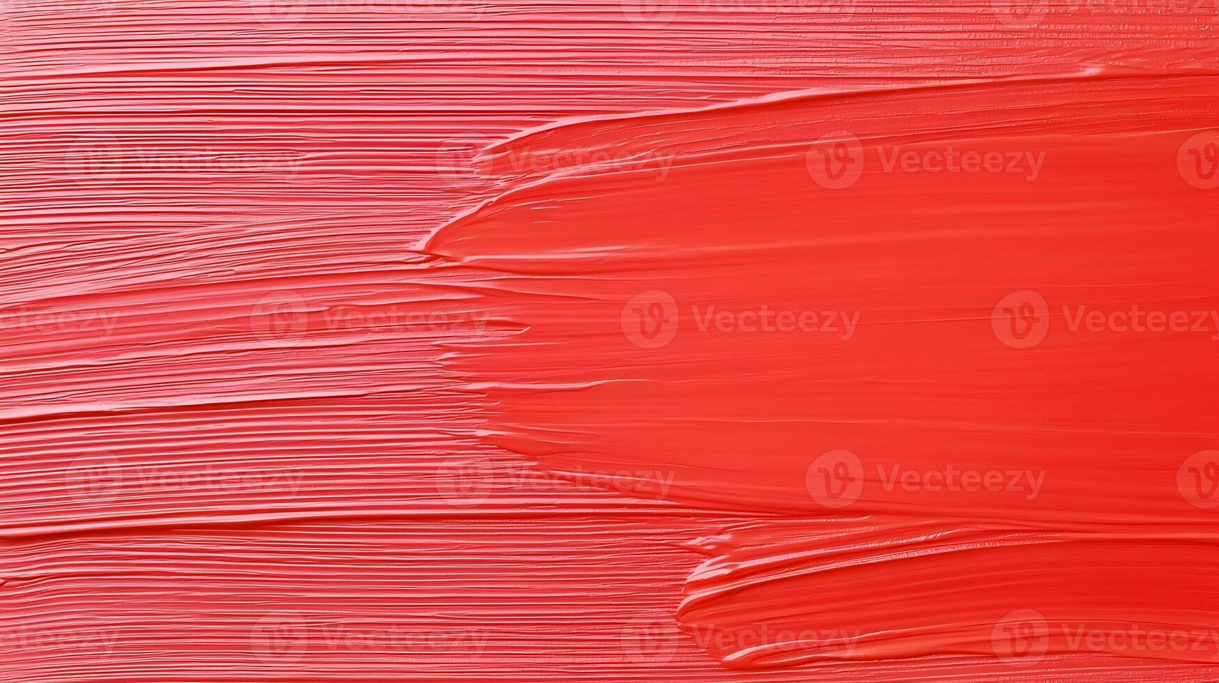 A red background with a lot of cracks and holes photo