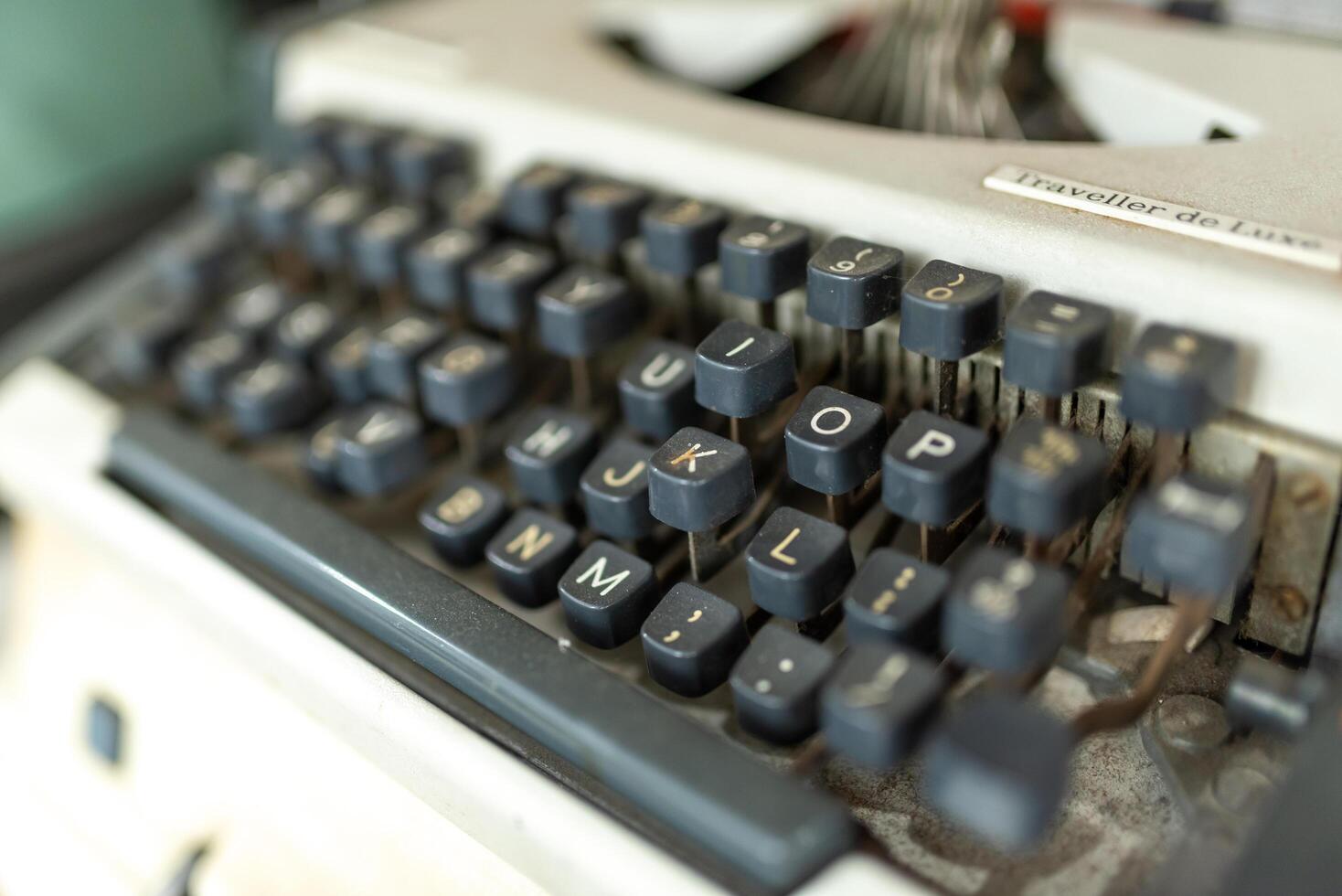 Old typewriter, close-up, shallow depth of field. photo