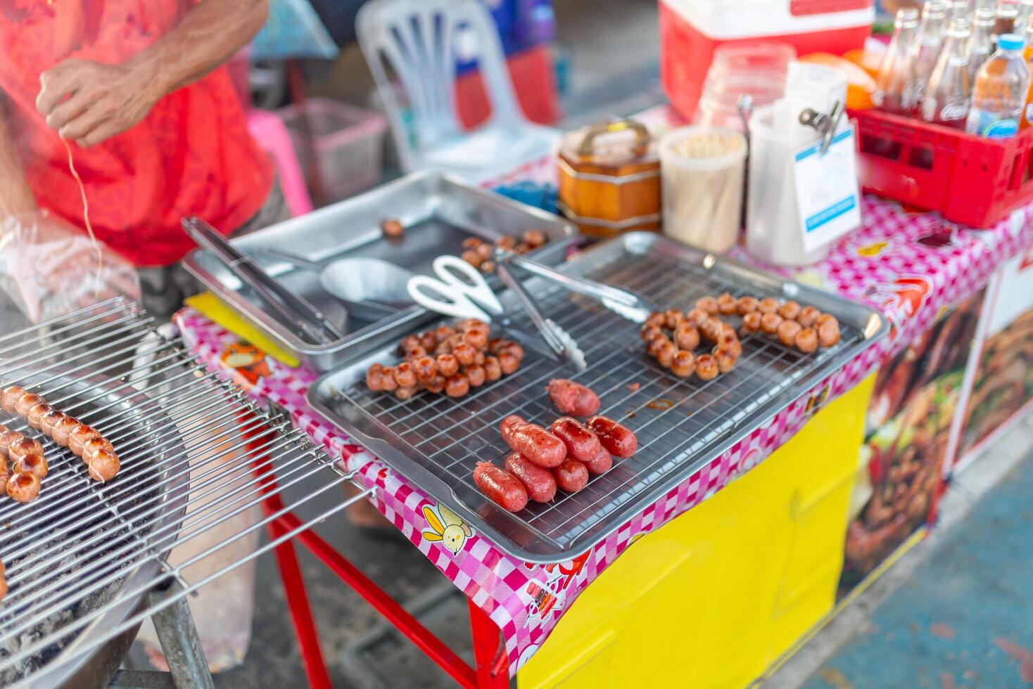 Grilled sausages on the street in Thailand, Asia. photo