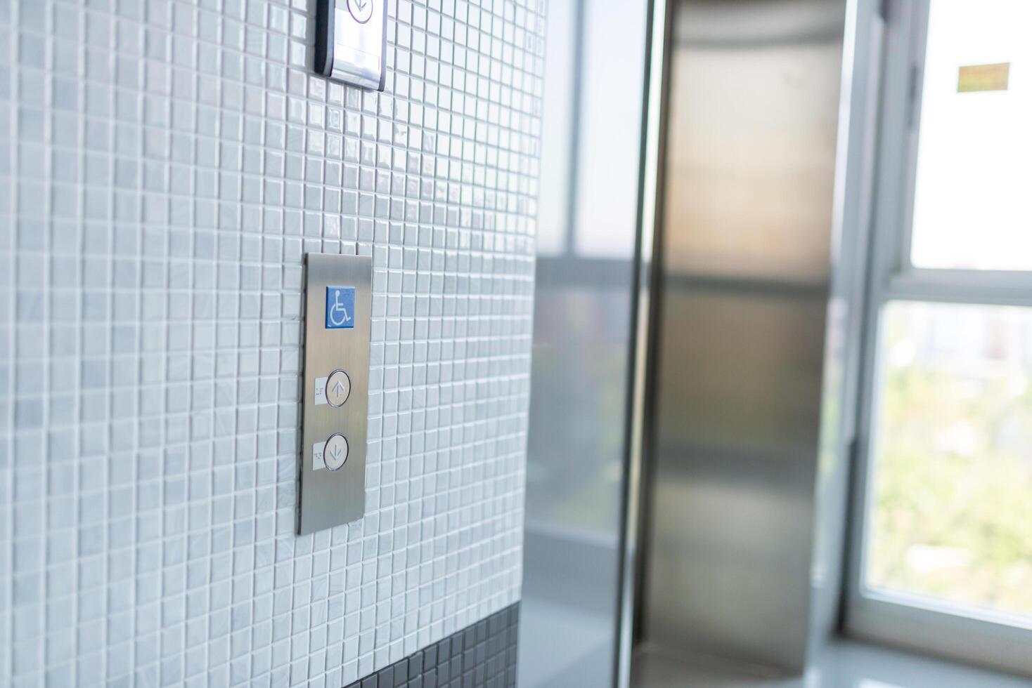 Interior of a modern closeup of the elevator button photo