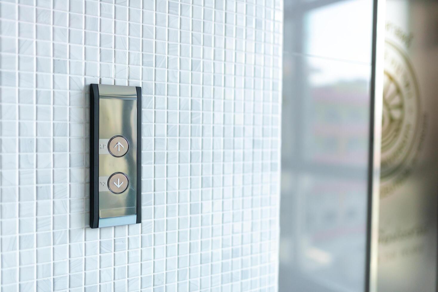 Interior of a modern closeup of the elevator button photo