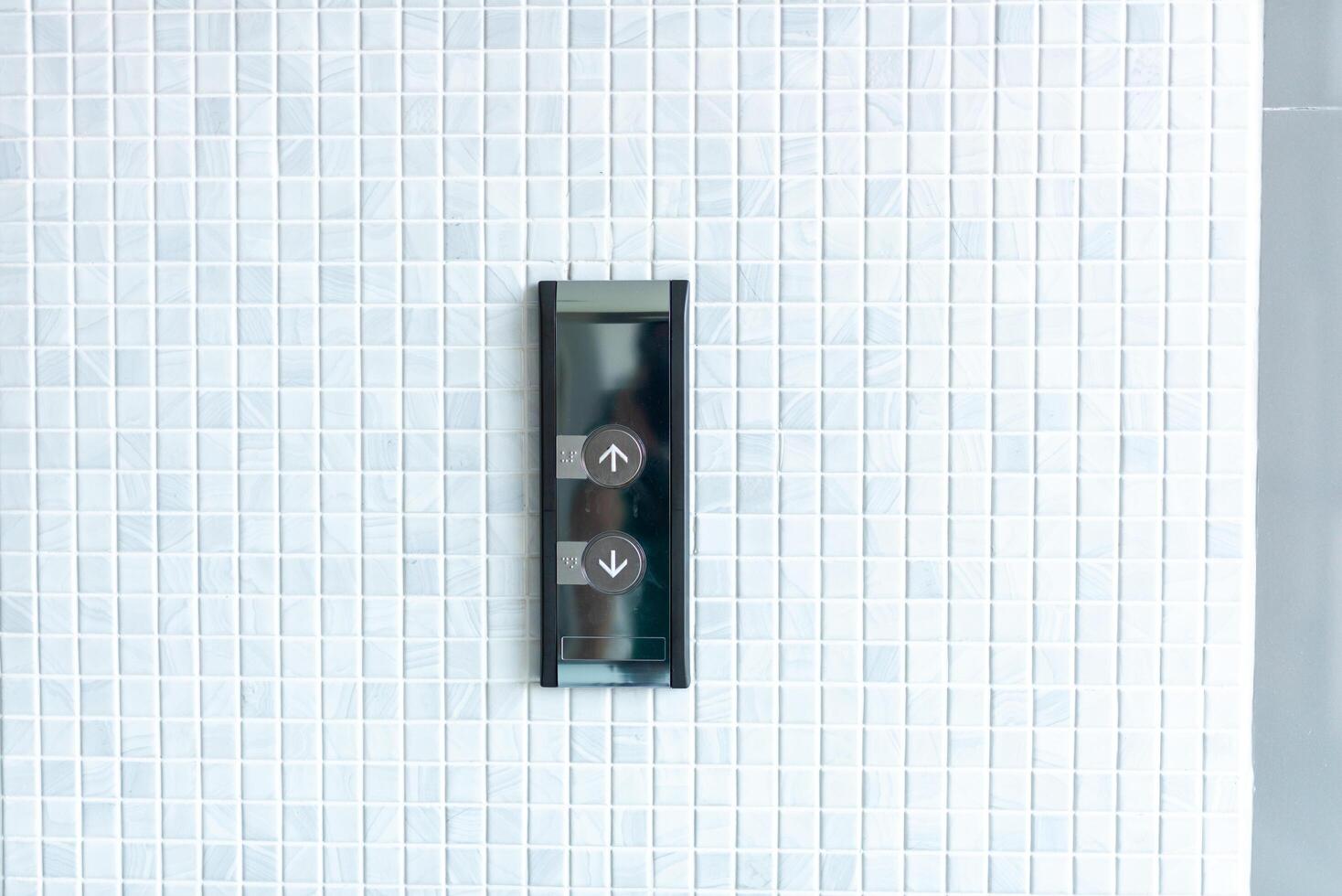 Interior of a modern closeup of the elevator button photo