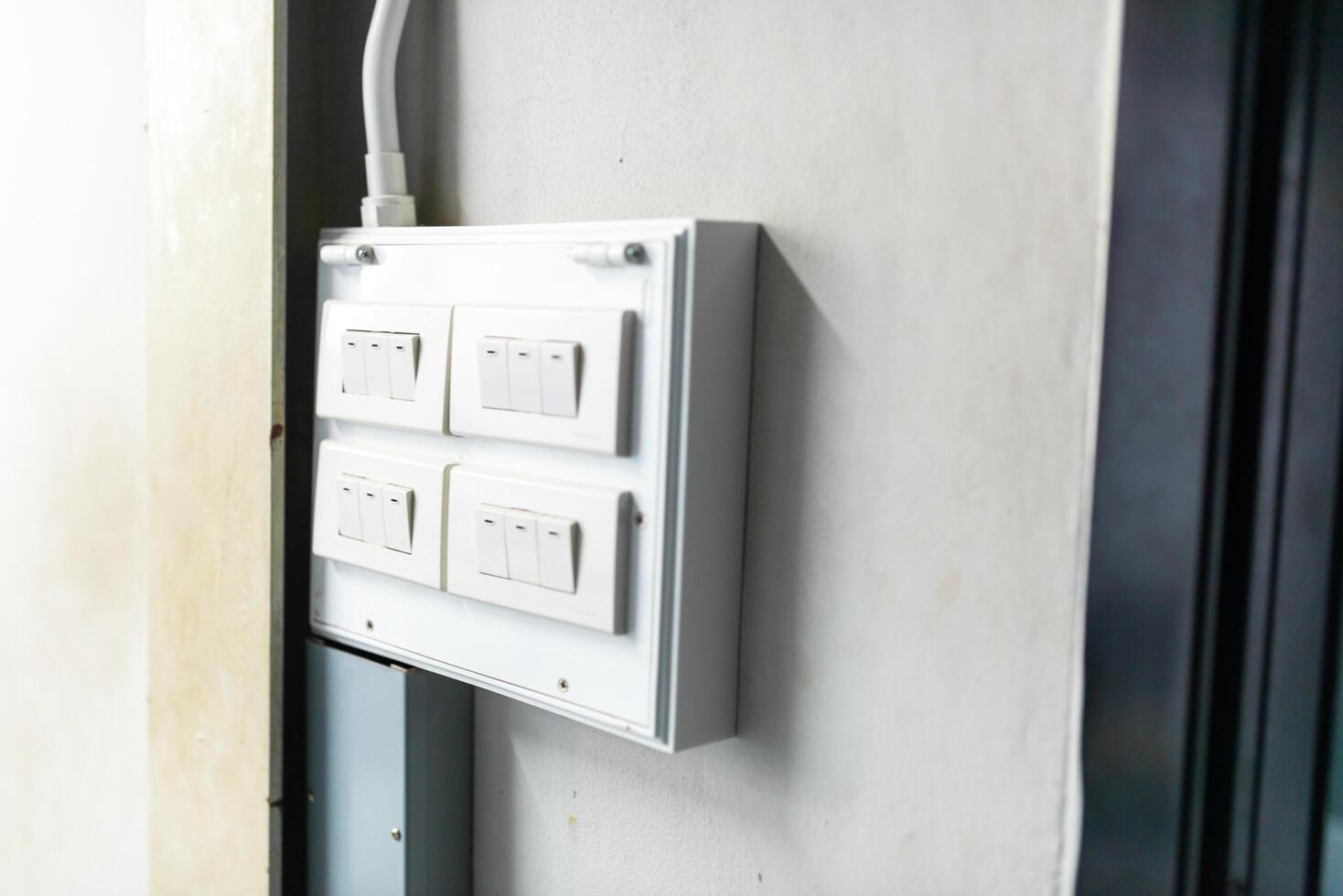Electrical outlet on the wall of the house. Close up. photo