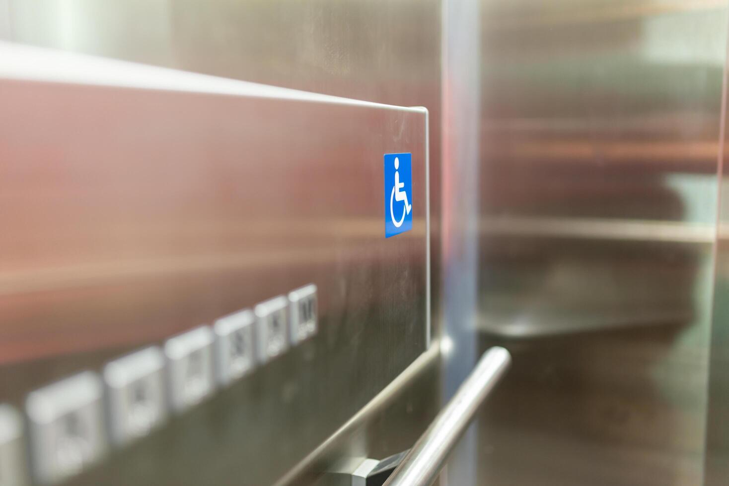 Interior of a modern closeup of the elevator button photo