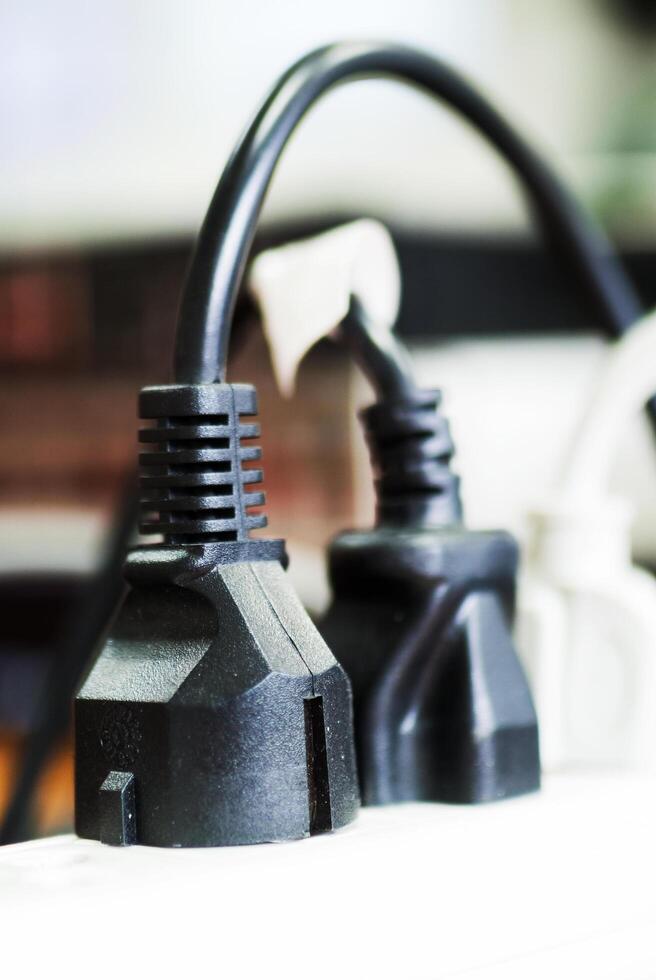 Wires plugged into power bar photo
