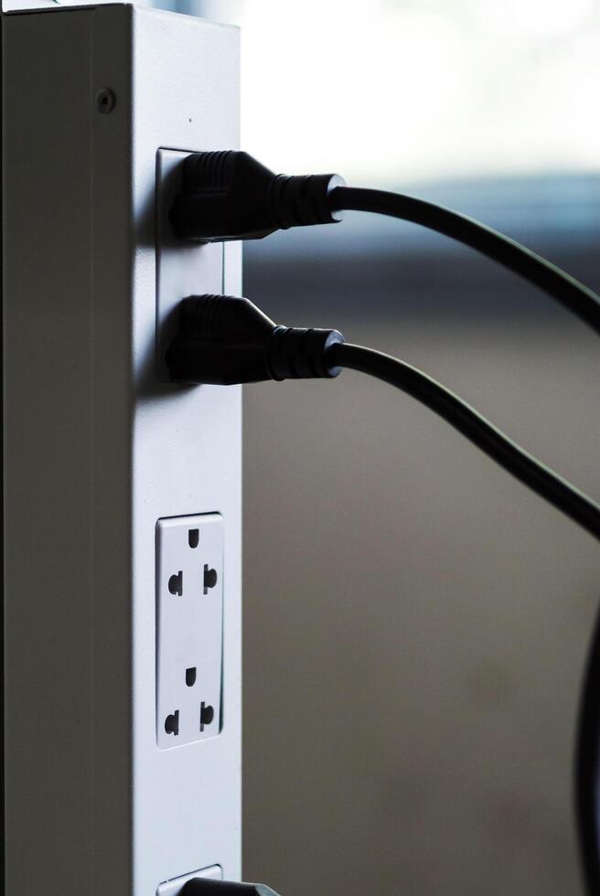 Wires plugged into power bar photo
