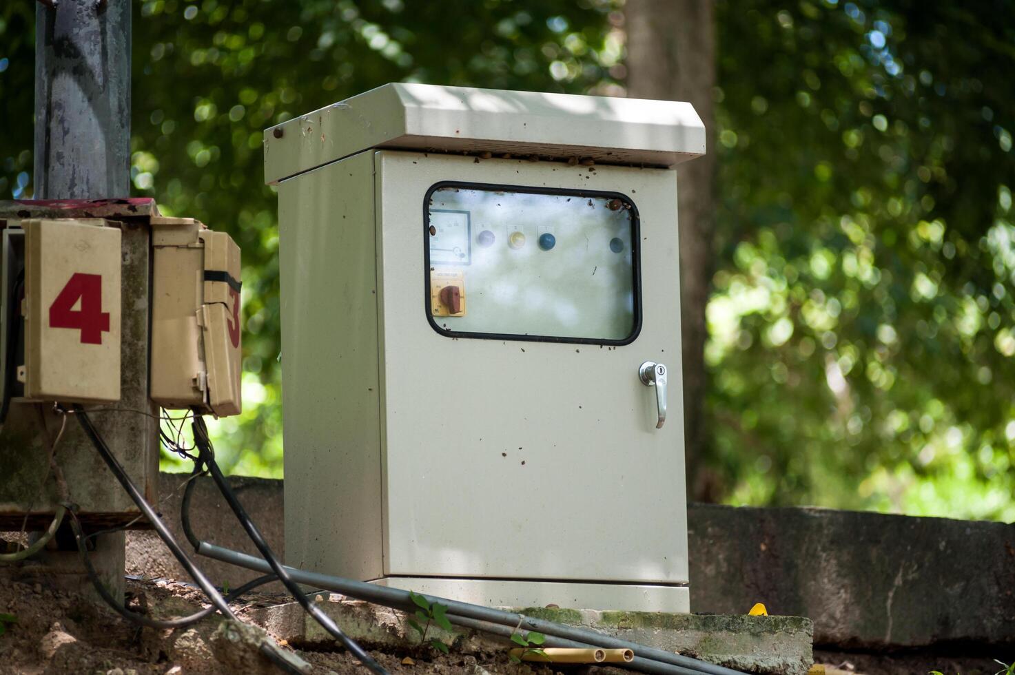 Electric outdoor fuse box in soft light photo