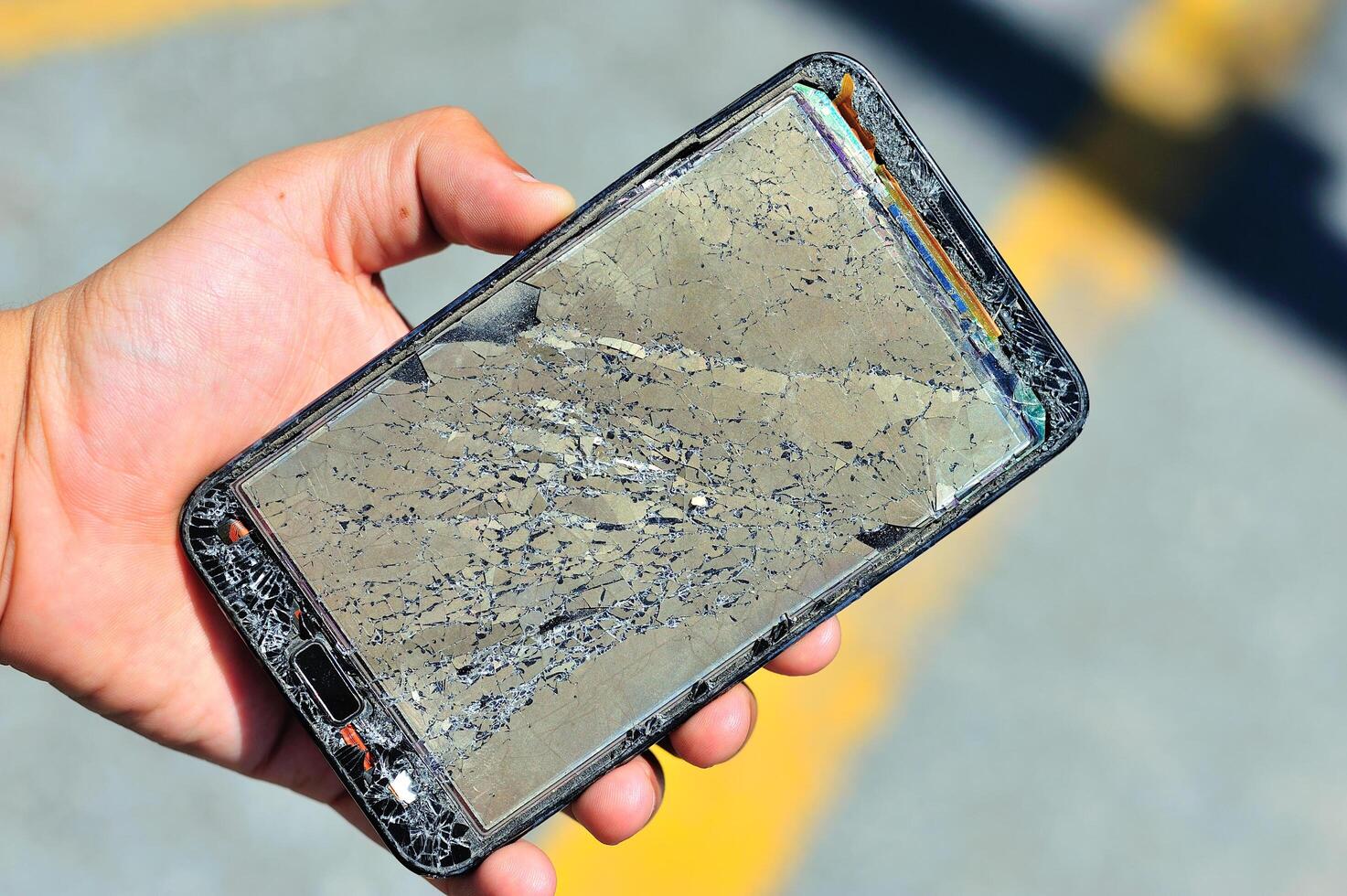 Broken damage mobile in sun light photo