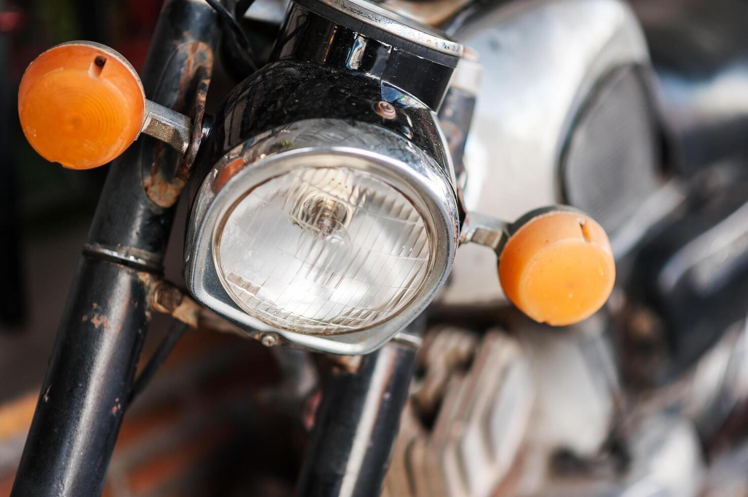 Old motorcycle in vintage place photo