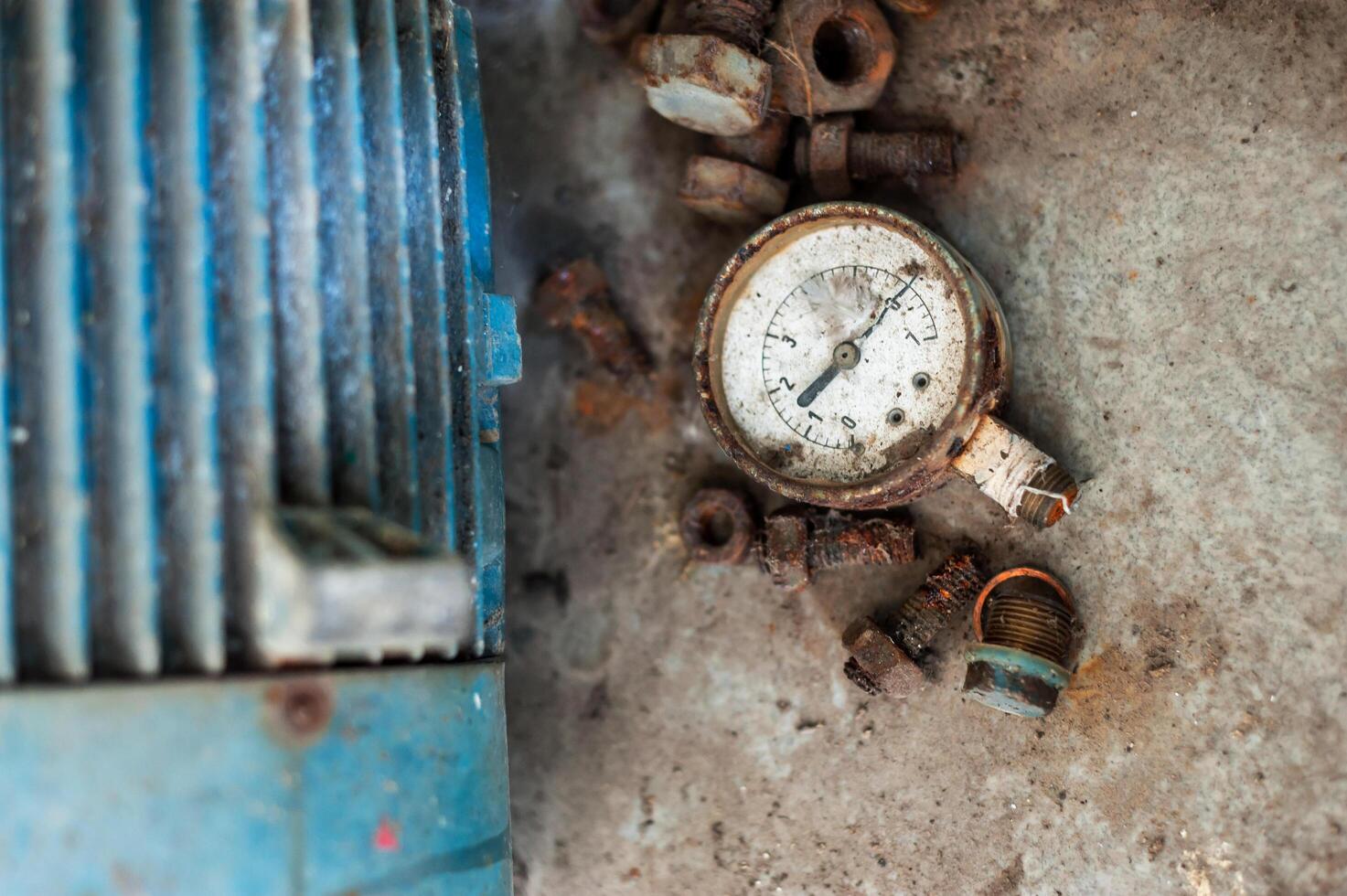 Old meter in dirty place . photo