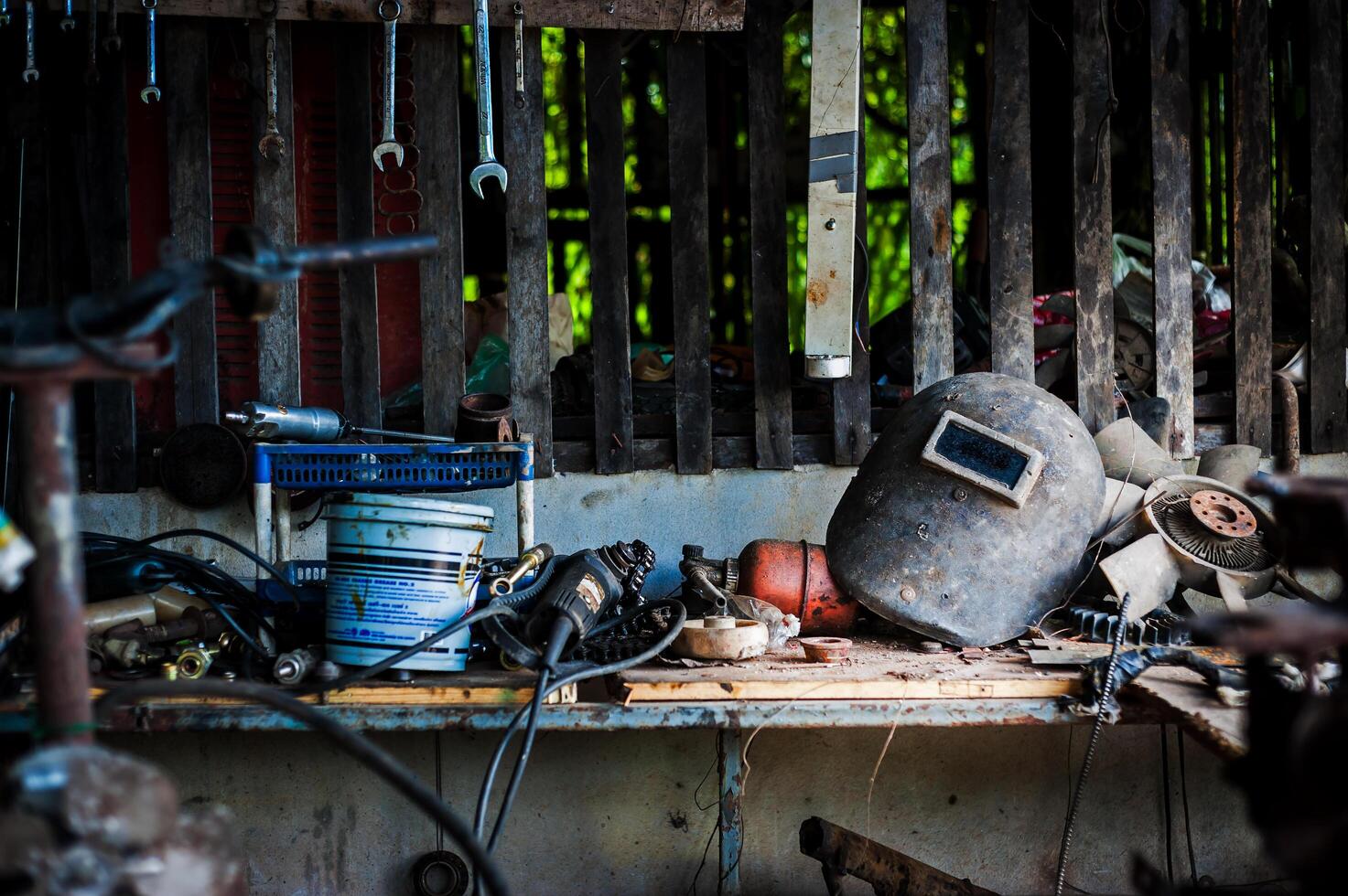 Welding helmet still life in equipment room photo