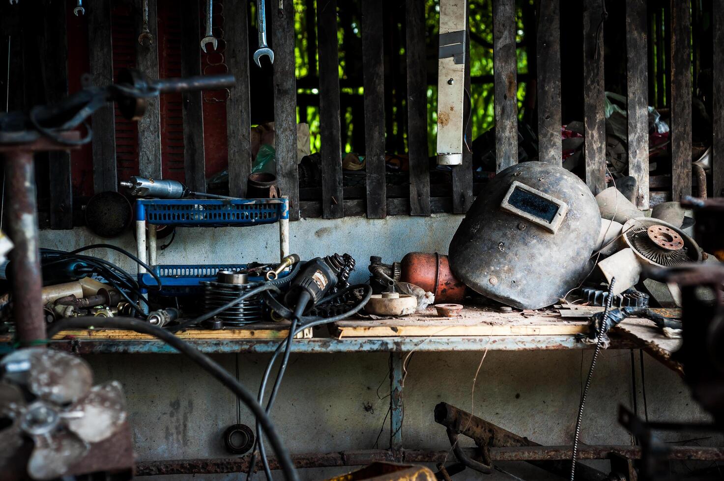 Welding helmet still life in equipment room photo
