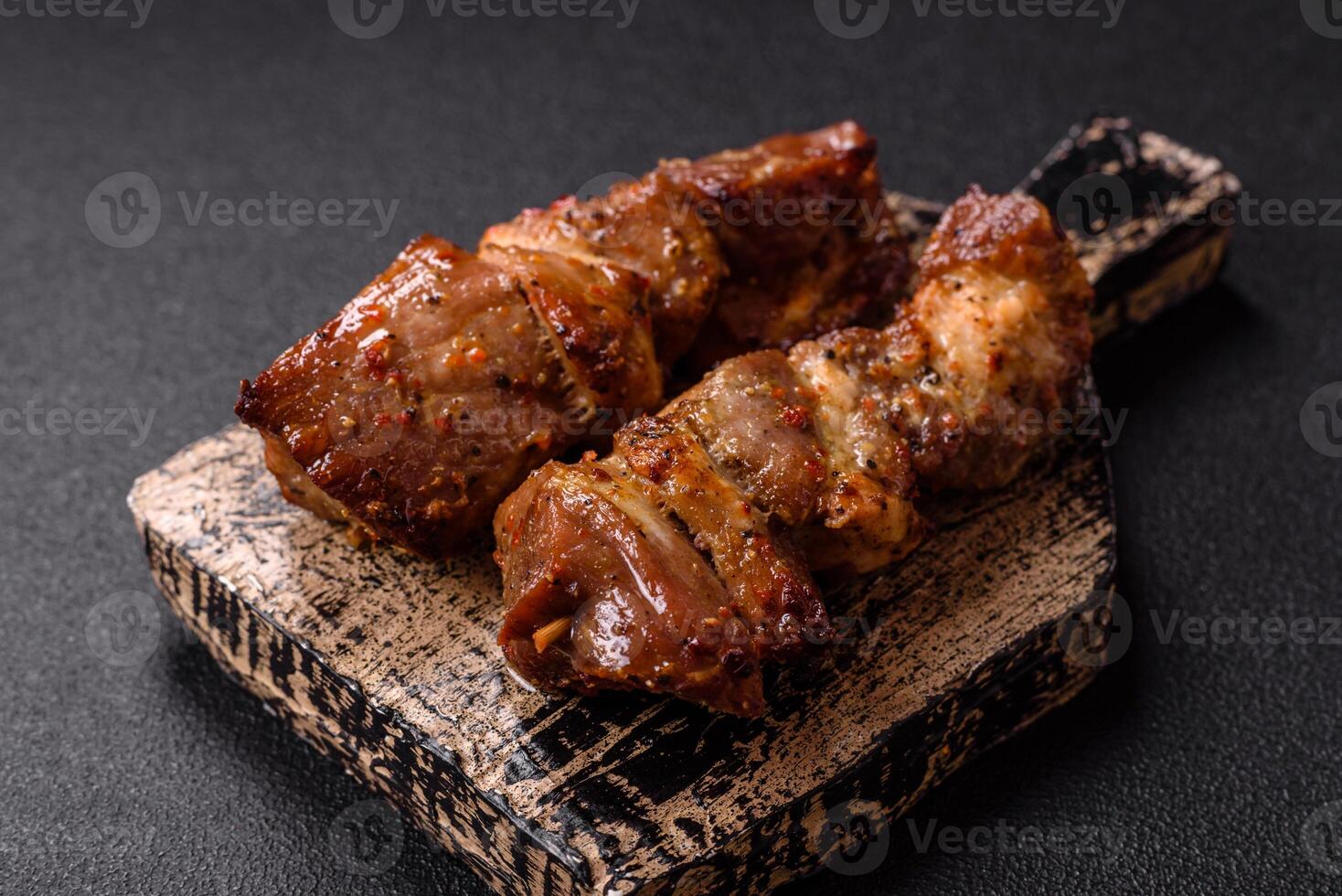 Delicious grilled chicken, turkey or pork skewers with salt, spices and herbs photo