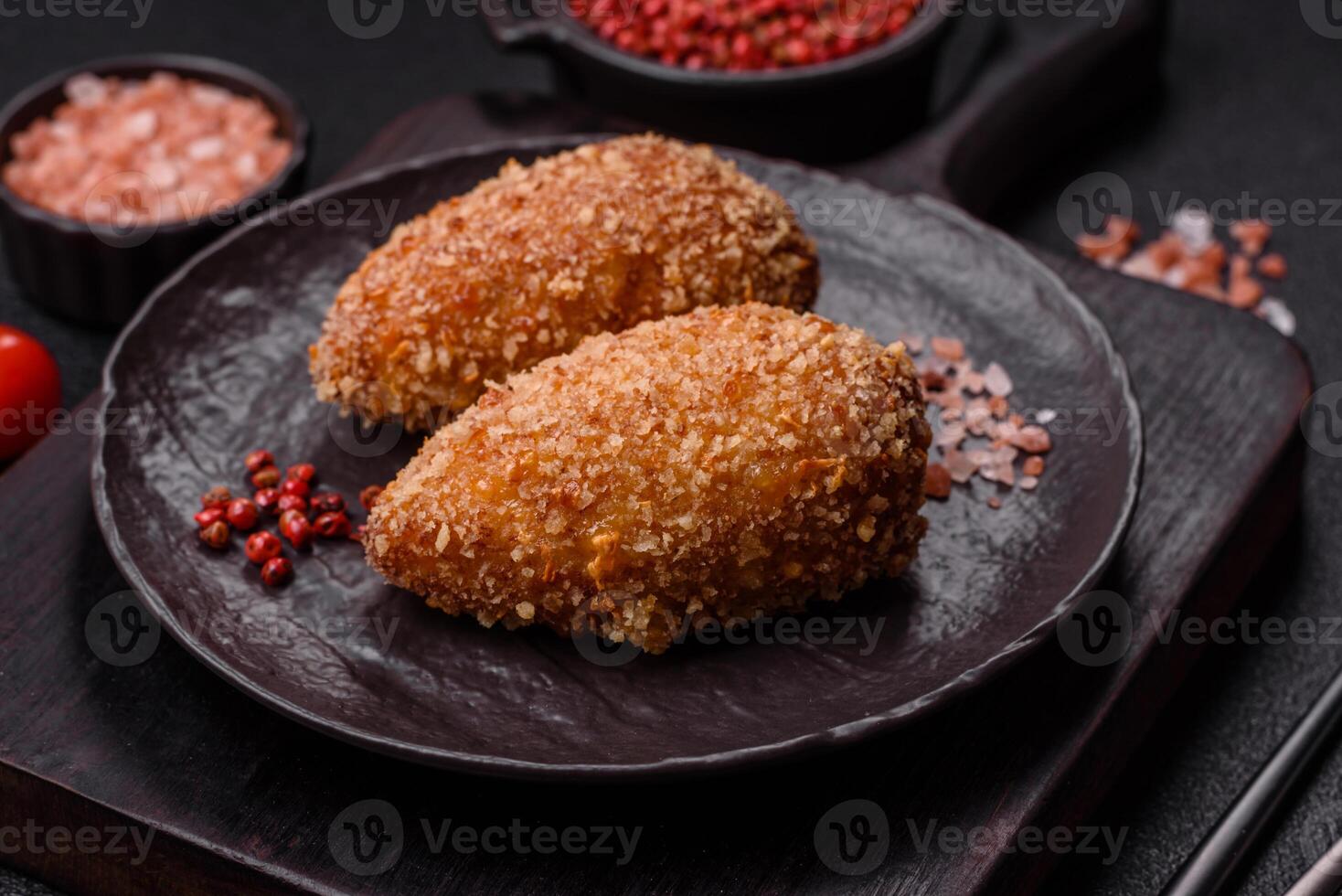Delicious fresh cutlet or meatball Kiev style with filling photo