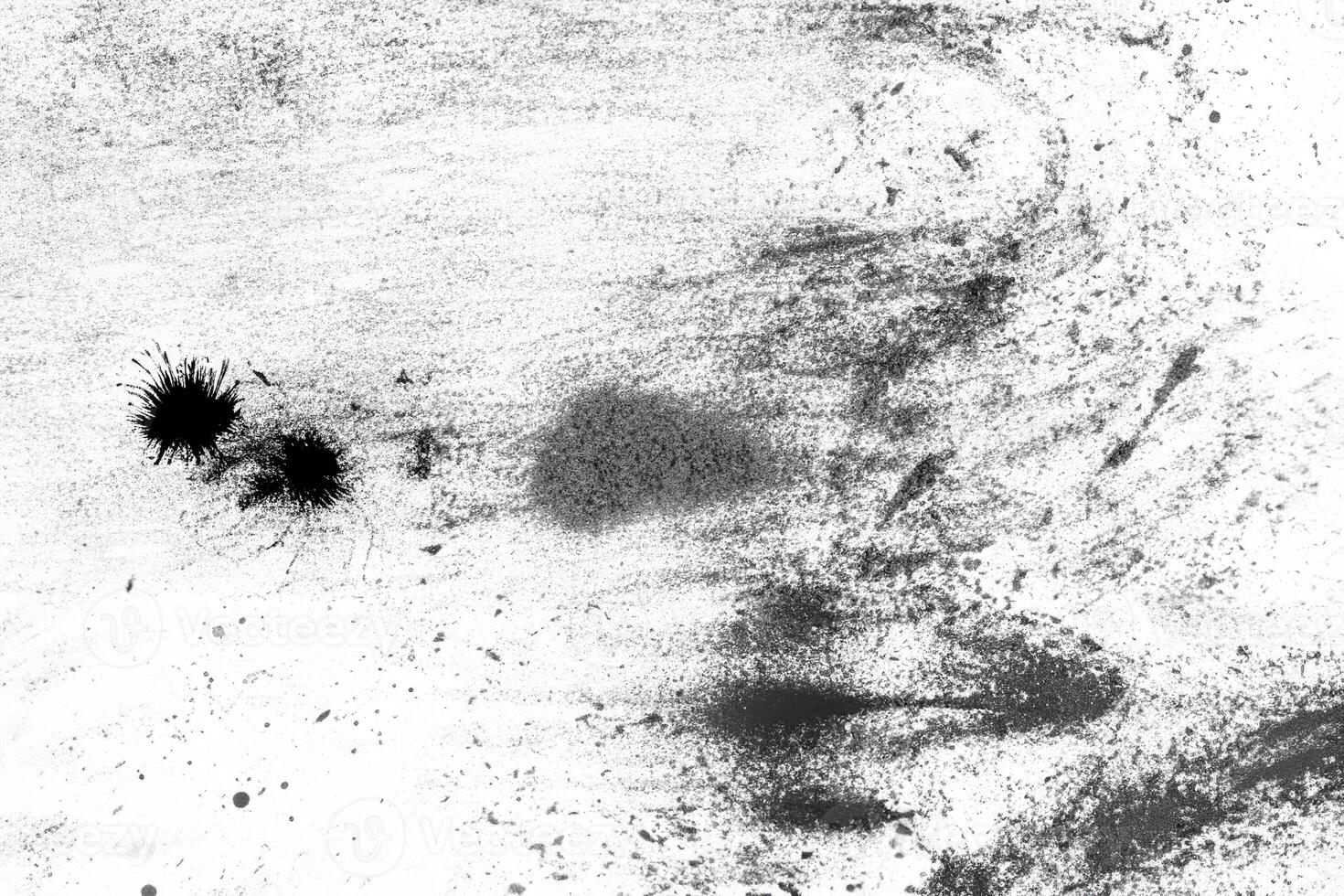 Rough charcoal streaks and smudges on white paper, abstract grunge texture perfect for design or background use. photo