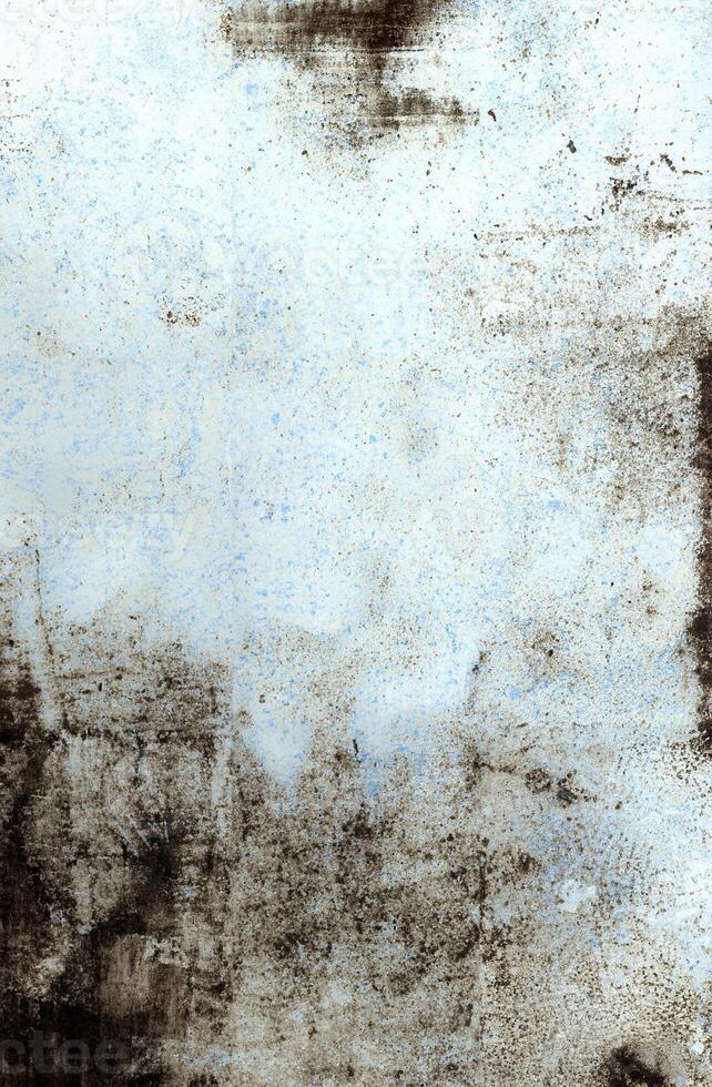 Weathered white and brown grunge texture with stains, rough patches, and aged patterns for creative backgrounds. photo