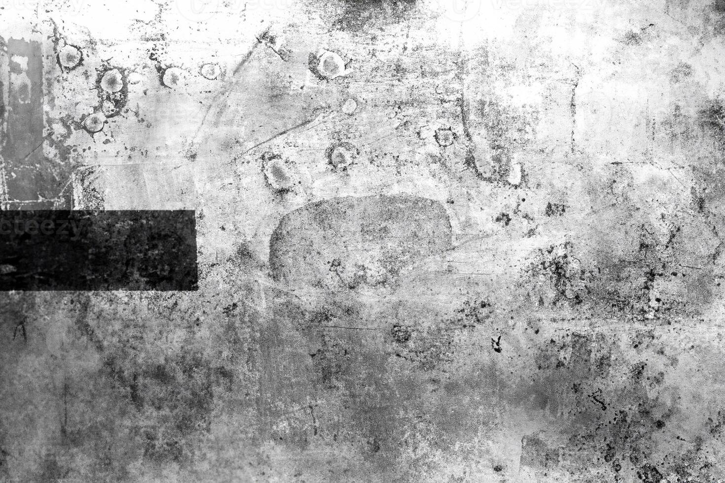 A gritty, weathered surface with scratches, stains, and textured marks, perfect for artistic overlays or design backgrounds. photo