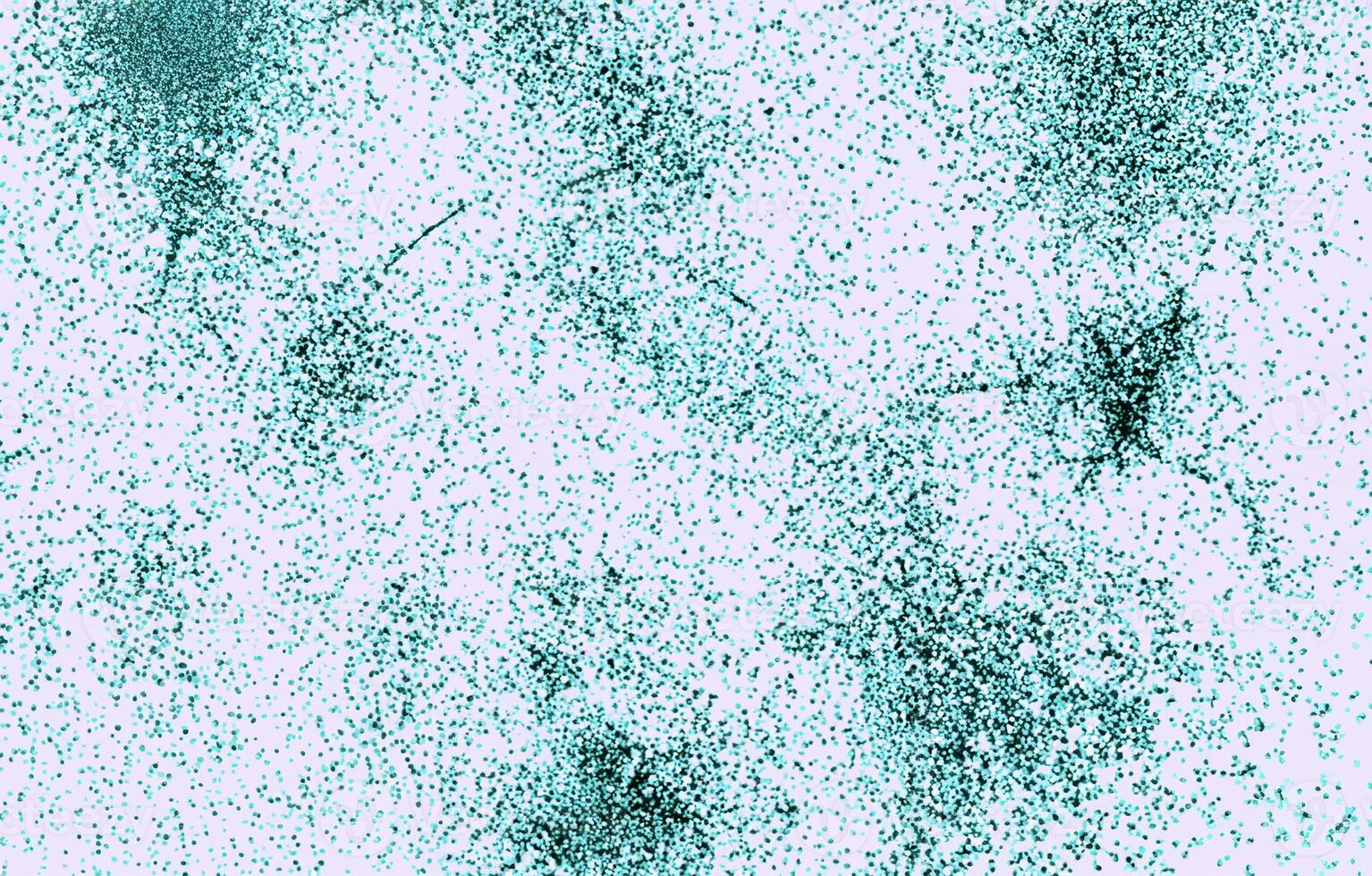 Abstract blue particle design forming a scattered pattern on a clean white background. photo
