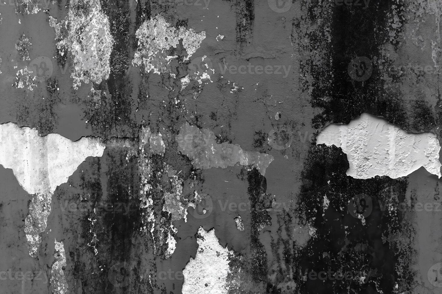 Rusty and weathered wall texture featuring peeling paint and rough grunge patterns, perfect for industrial or artistic backgrounds. photo