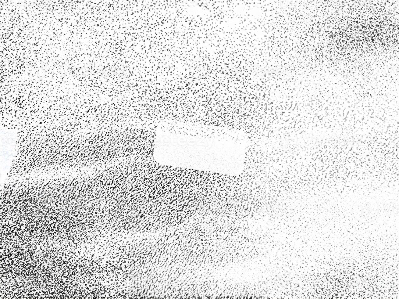 High-contrast black-and-white abstract texture with a grainy noise effect, ideal for overlays or creative backgrounds. photo