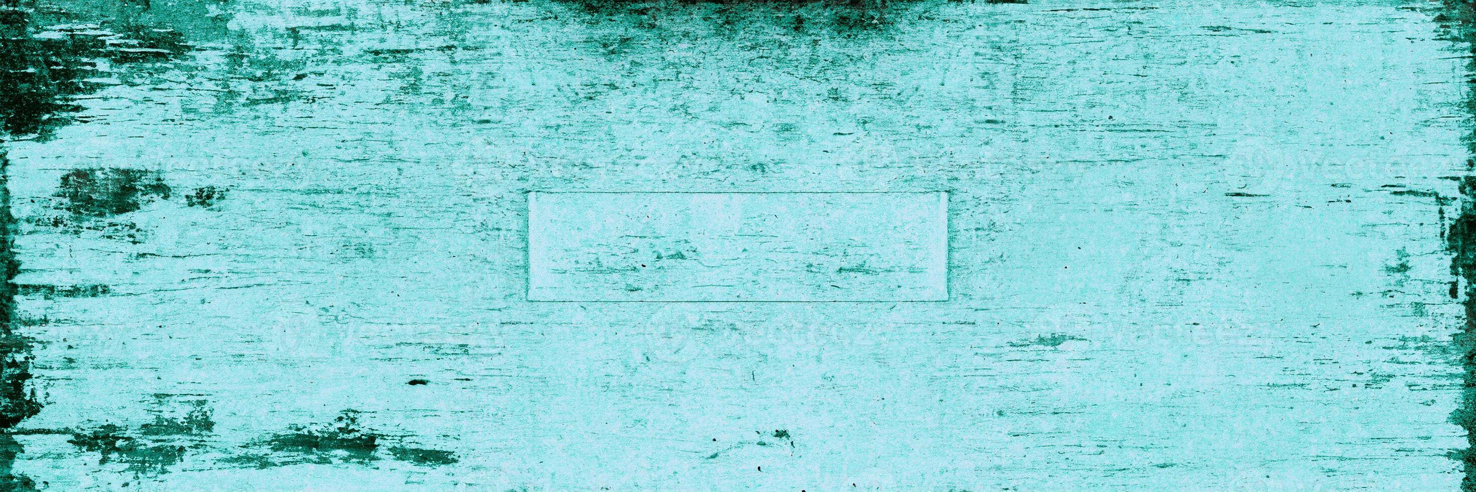 Teal grunge texture with distressed and weathered patterns, suitable for backgrounds, overlays, or artistic design. photo