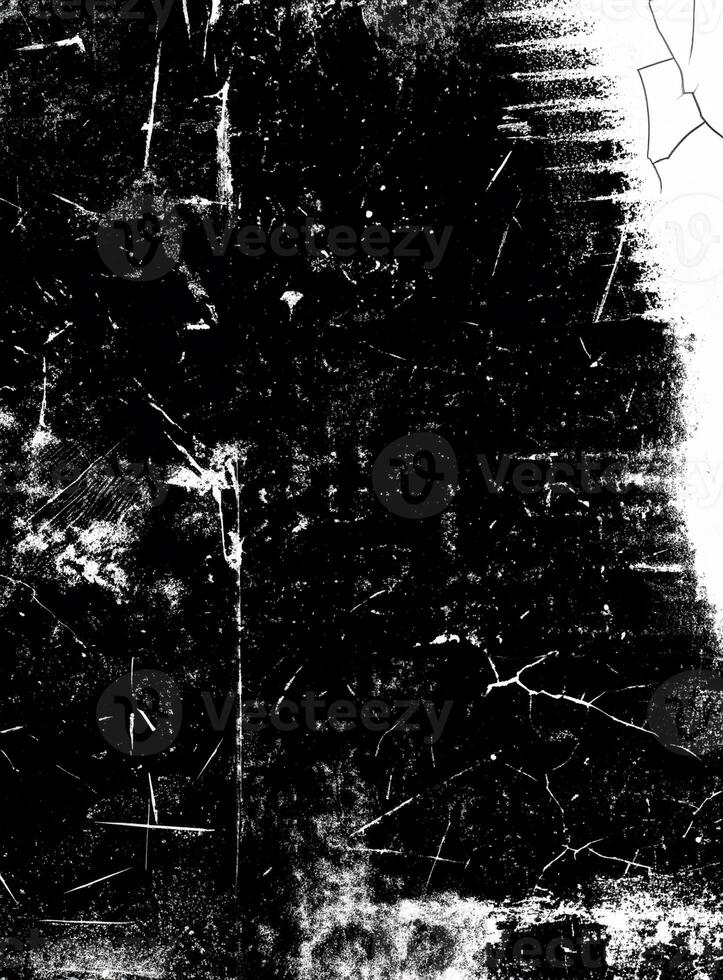 Abstract black and white texture featuring distressed patterns, scratches, and cracks, perfect for design overlays. photo