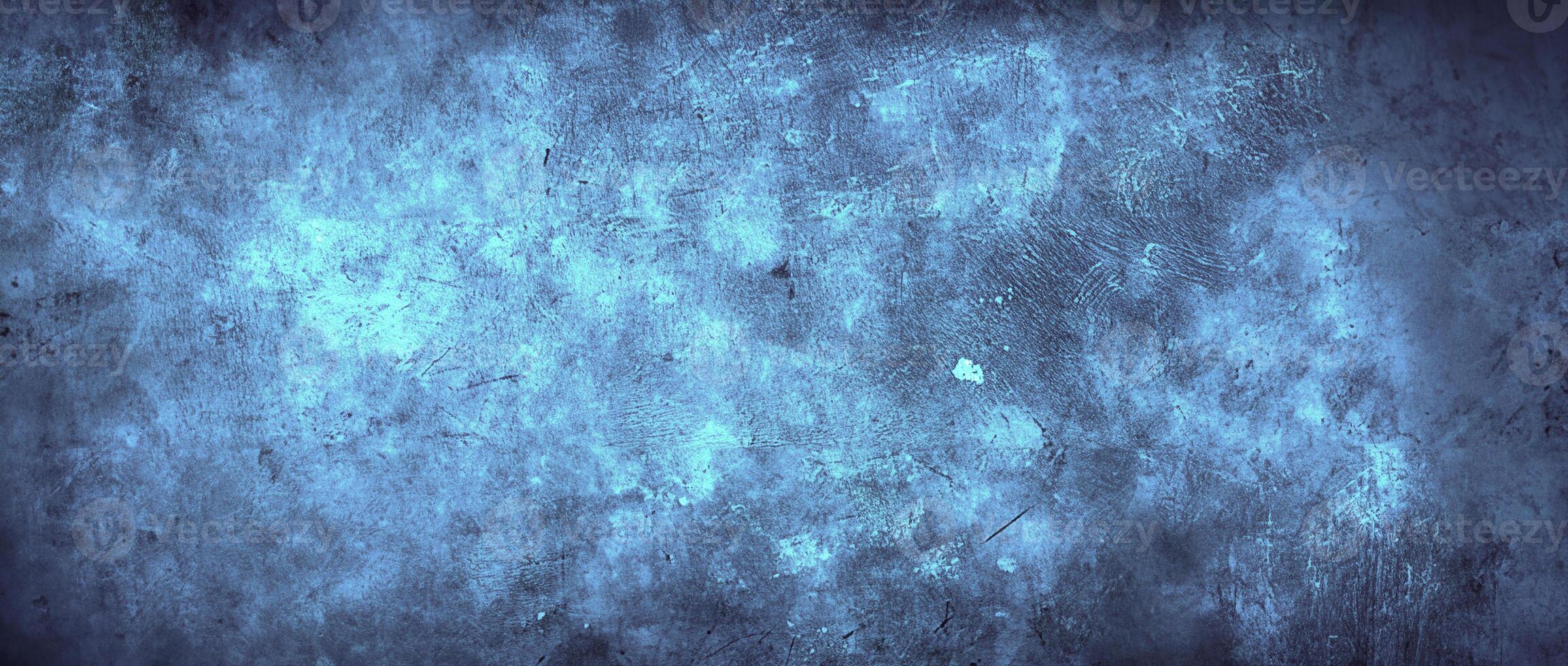 Abstract blue grunge texture with subtle scratches and cloud-like patterns, ideal for backgrounds or overlays. photo