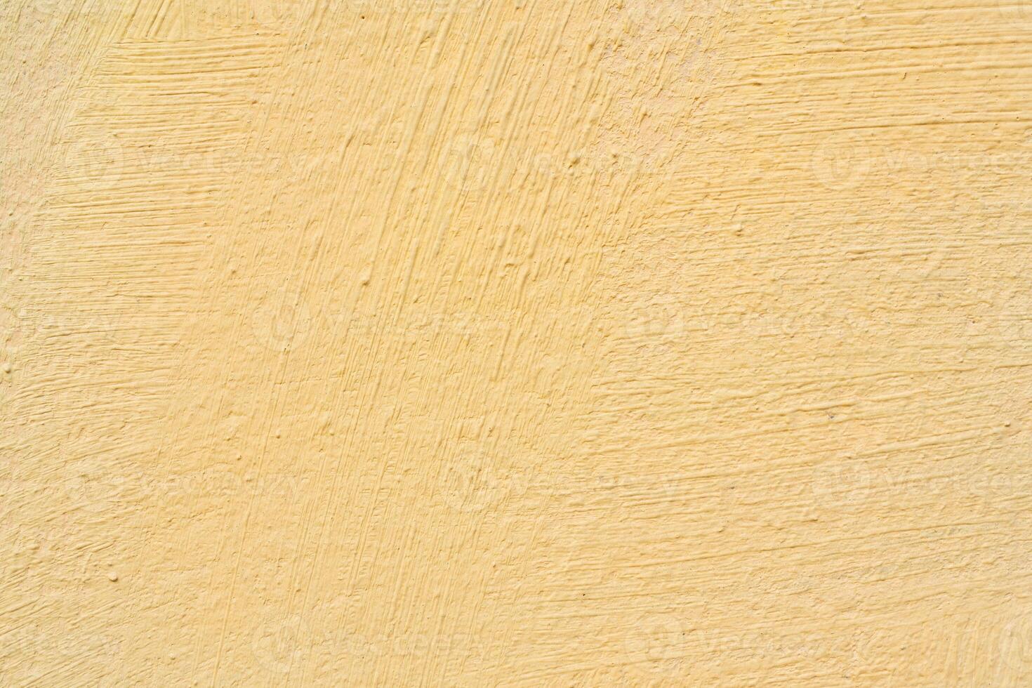 Texture of yellow stucco for modern interior. Abstract pink background. photo