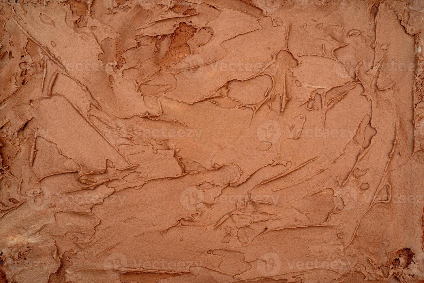 Chocolate ice cream texture. Top view. Delicious cool treat. photo