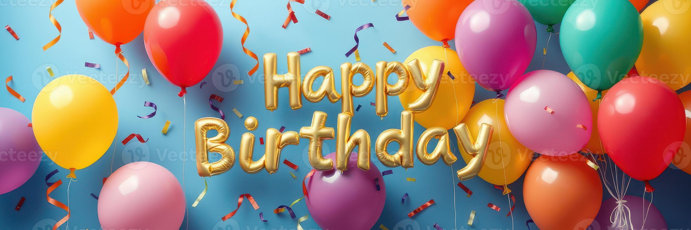 Colorful birthday celebration decorations with balloons and festive message on blue background photo