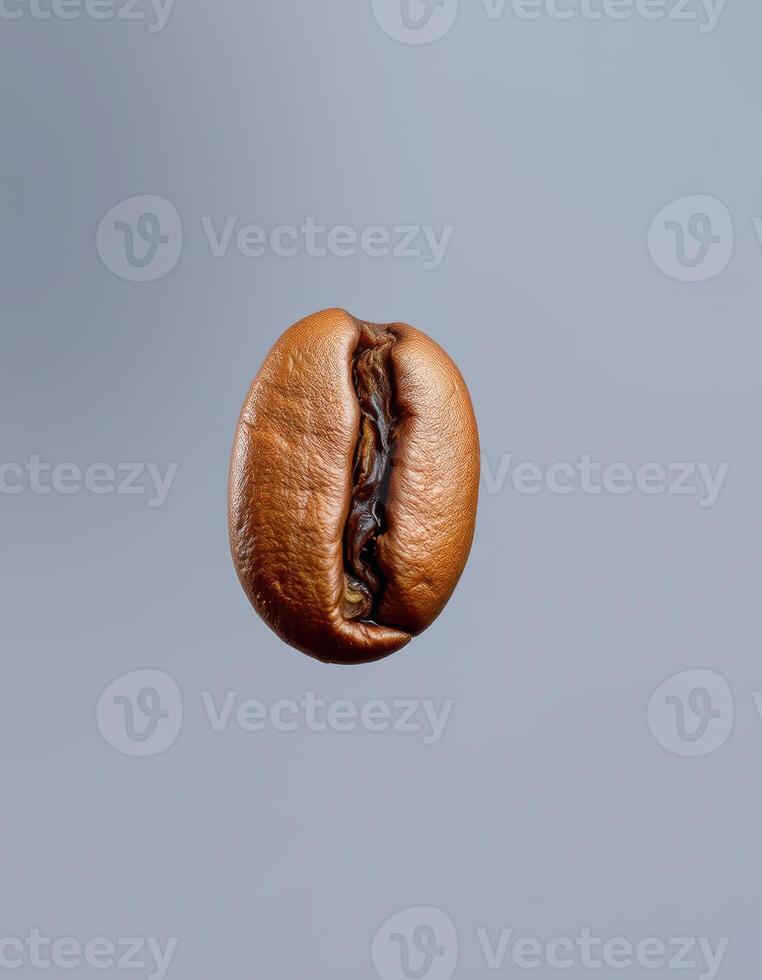 Brown coffee bean floating against a simple blue backdrop with subtle textures and patterns in the background photo