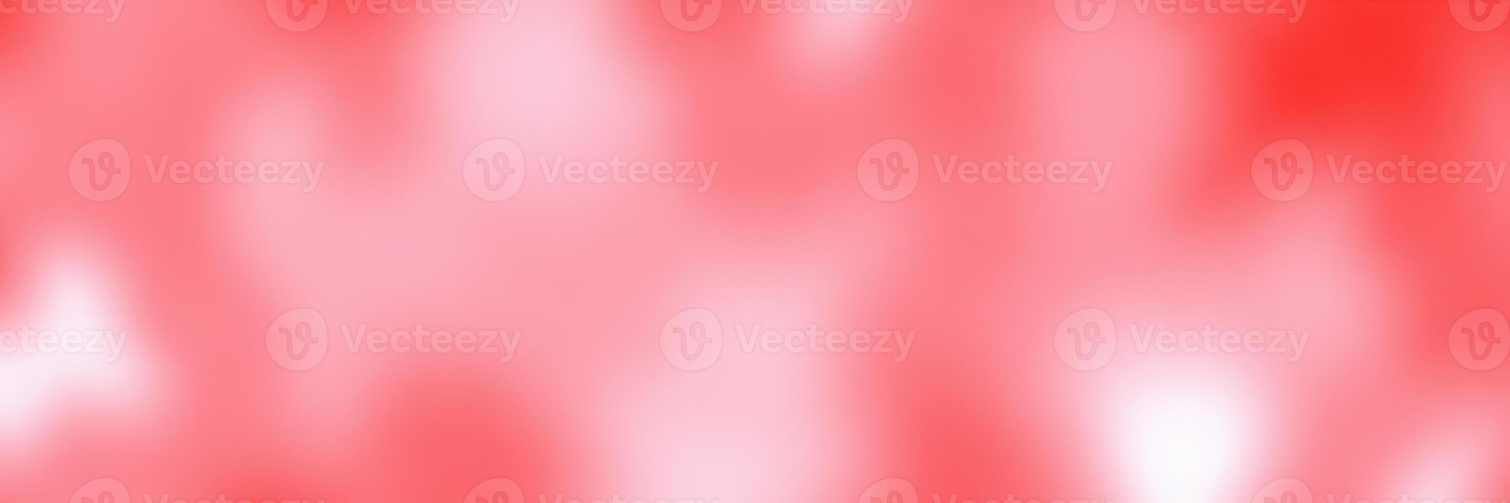 Bright pink and red abstract background with blurred textures creating a warm atmosphere photo