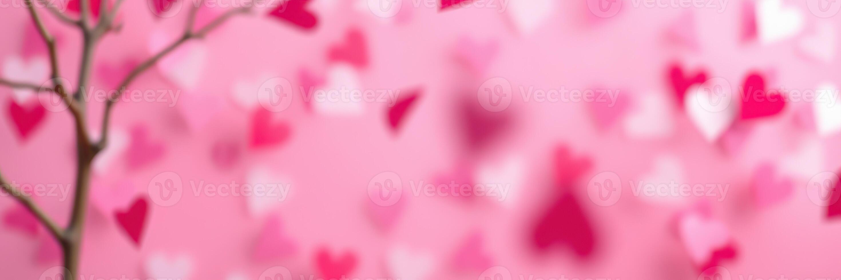 Valentine's Day decorations with hearts on a pink background creating a festive atmosphere photo