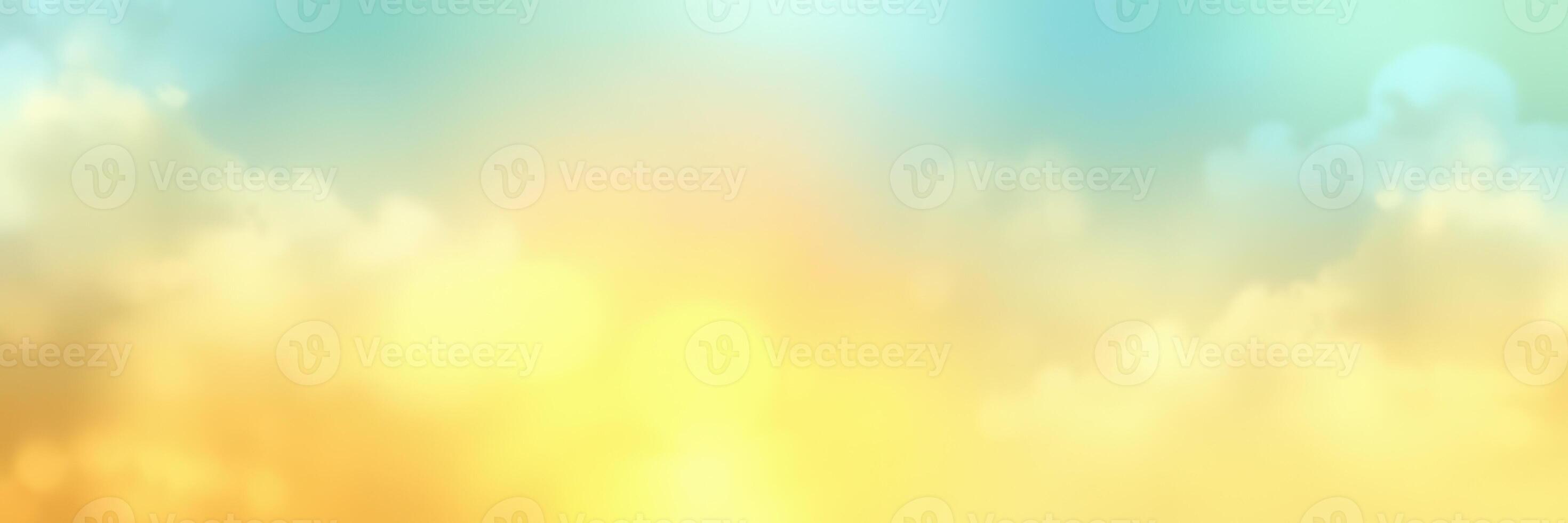 Beautiful sunrise with soft clouds displaying shades of blue, orange, and yellow in the early morning sky over a serene landscape photo