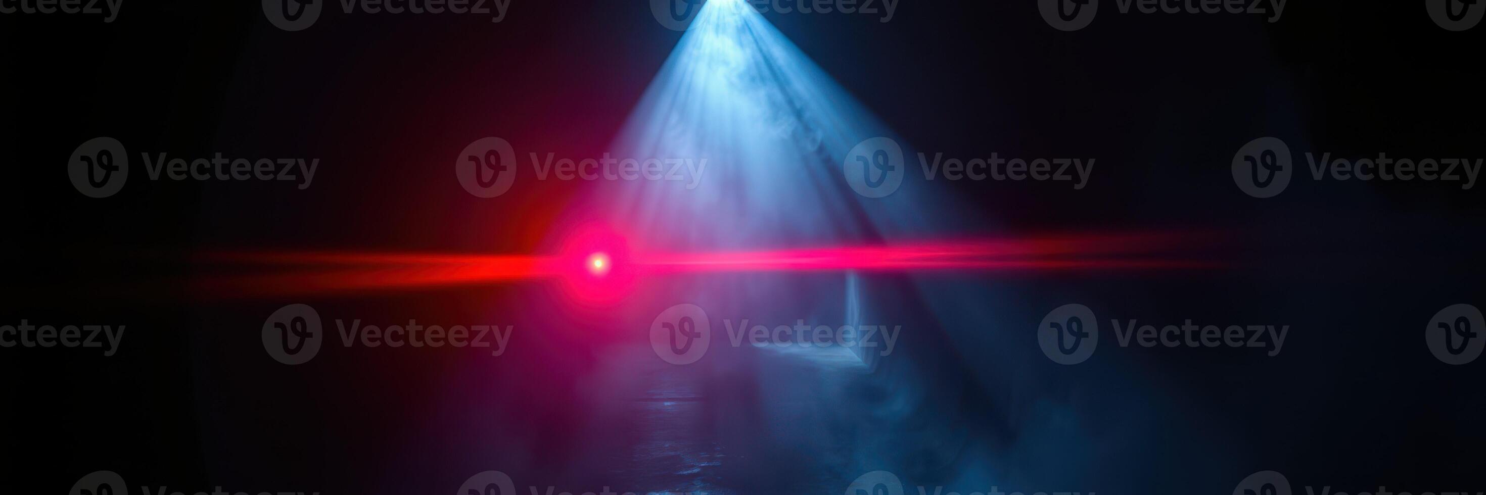 Colorful light beams create a captivating atmosphere in a dark setting during a late-night event photo
