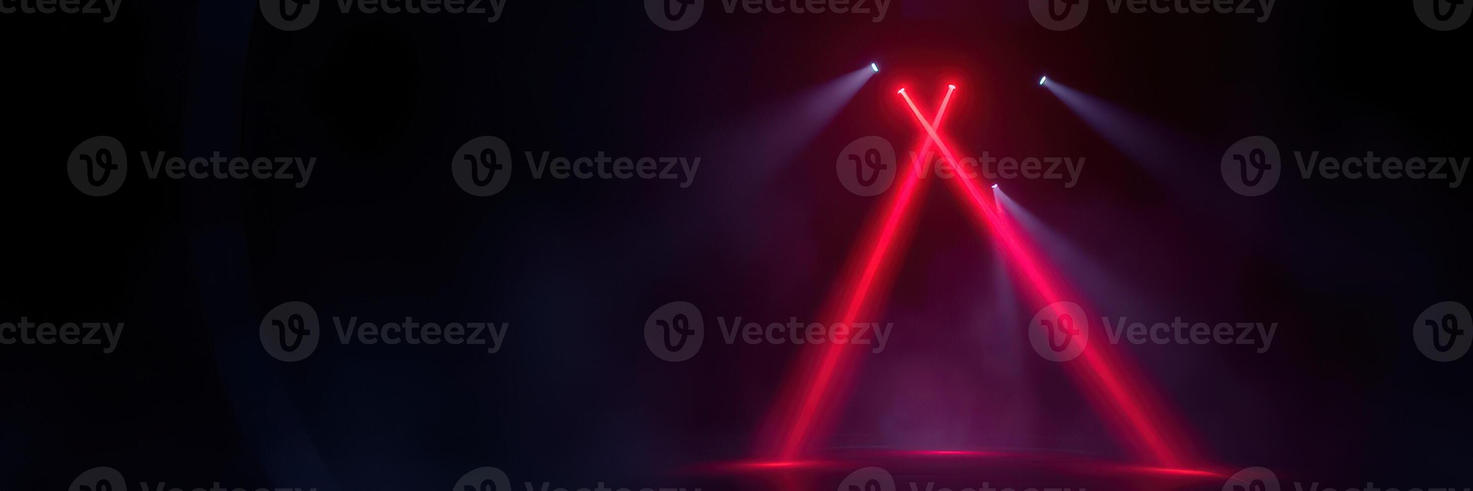 Vibrant red laser lights create a captivating atmosphere at a live music event in the evening photo