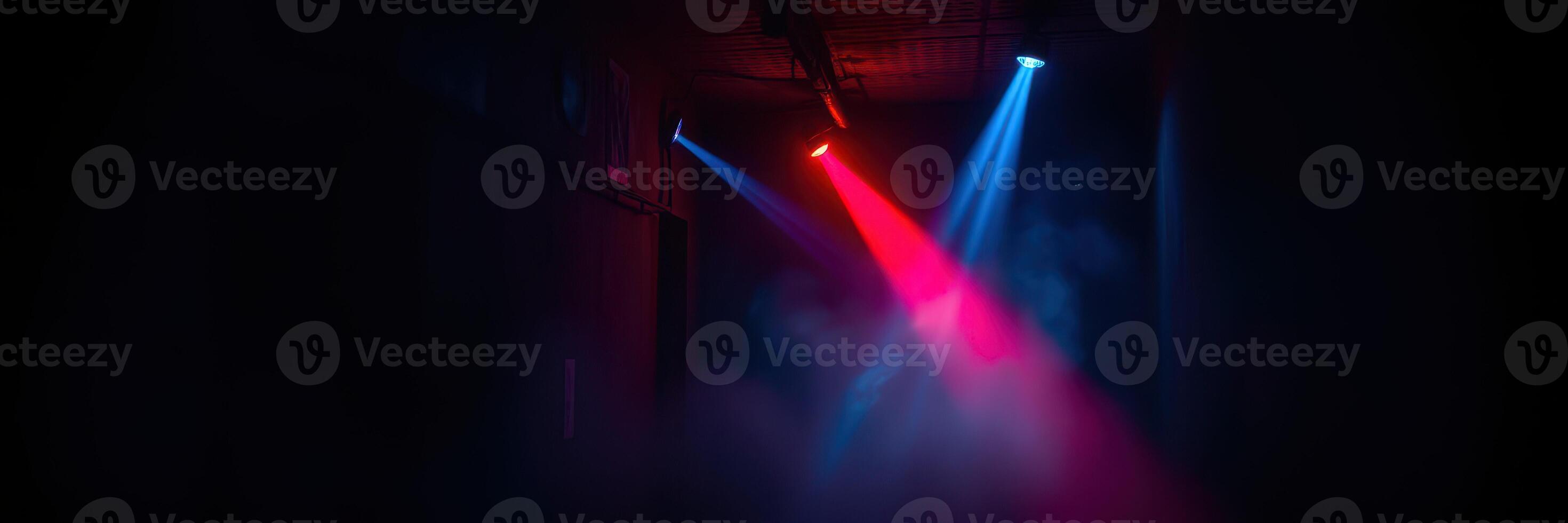 Colorful stage lights illuminate a smoky atmosphere during a night event in a vibrant venue photo