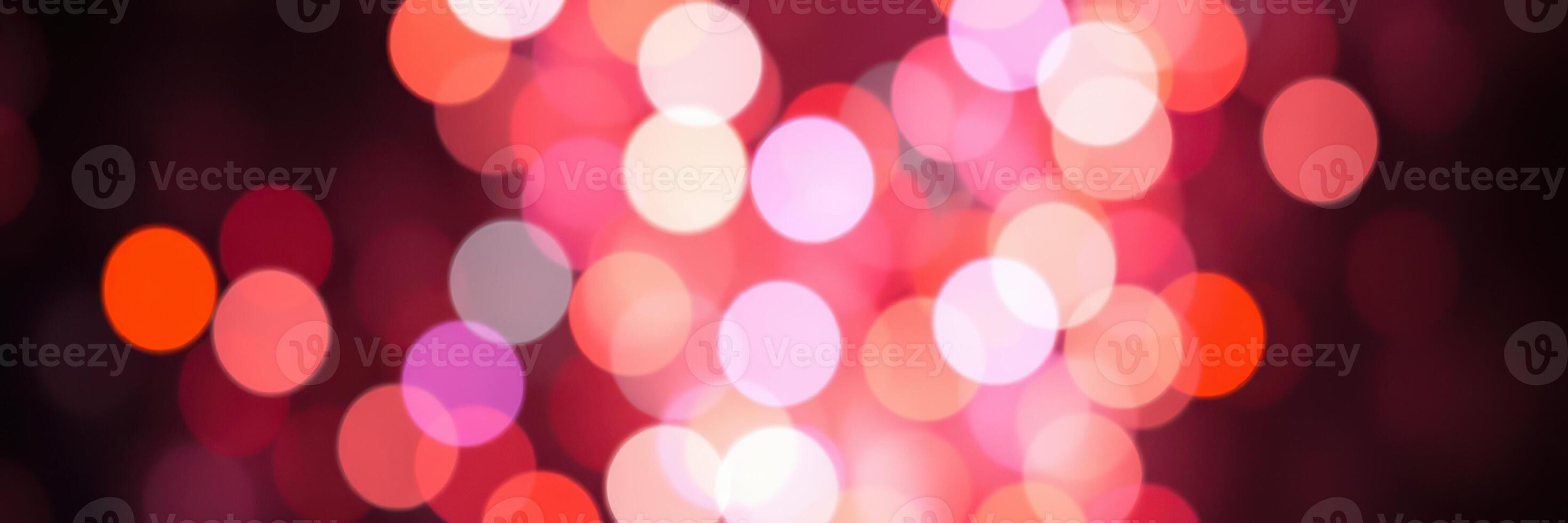Colorful bokeh lights creating a vibrant atmosphere during a nighttime celebration photo