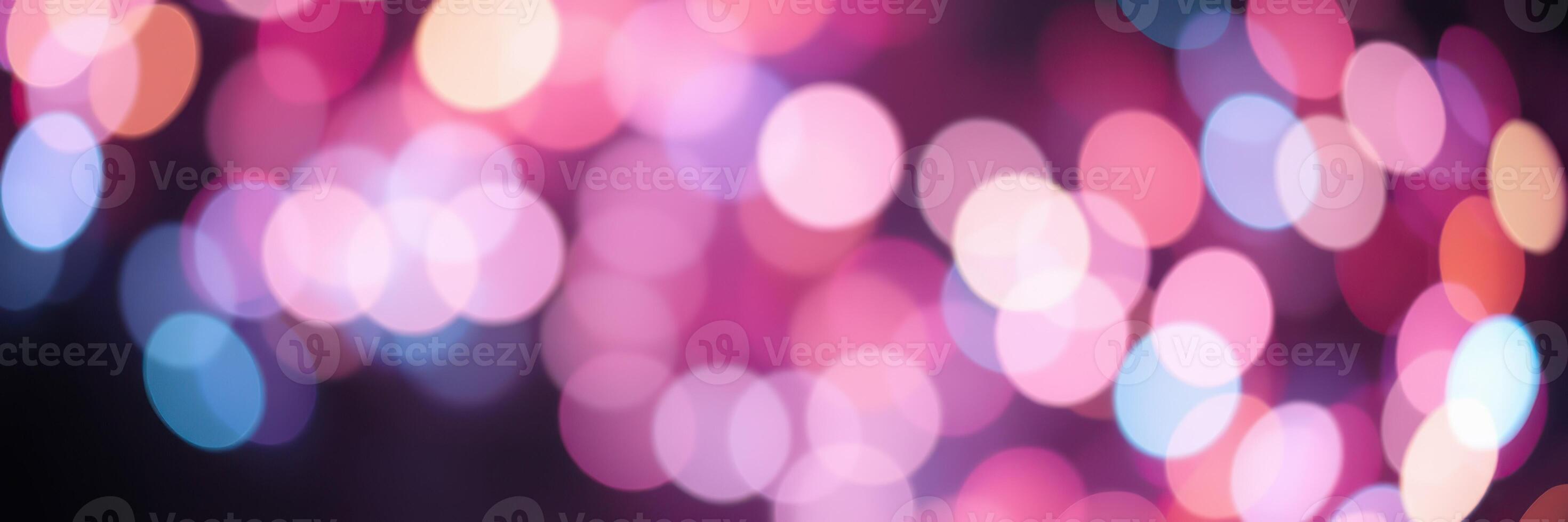 Colorful bokeh lights create a magical atmosphere during a nighttime celebration in a vibrant setting photo