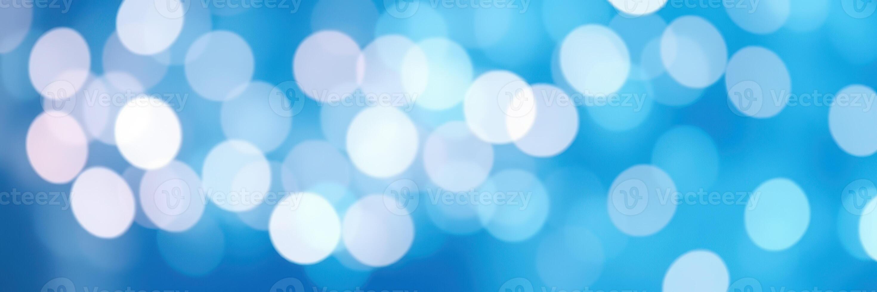 Decorative blue bokeh lights create a soft and dreamy atmosphere for a festive occasion photo