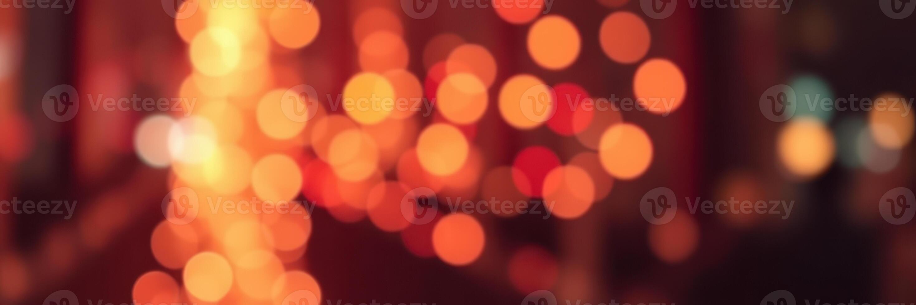 Warm glow of city lights during a festive evening with blurred bokeh background photo