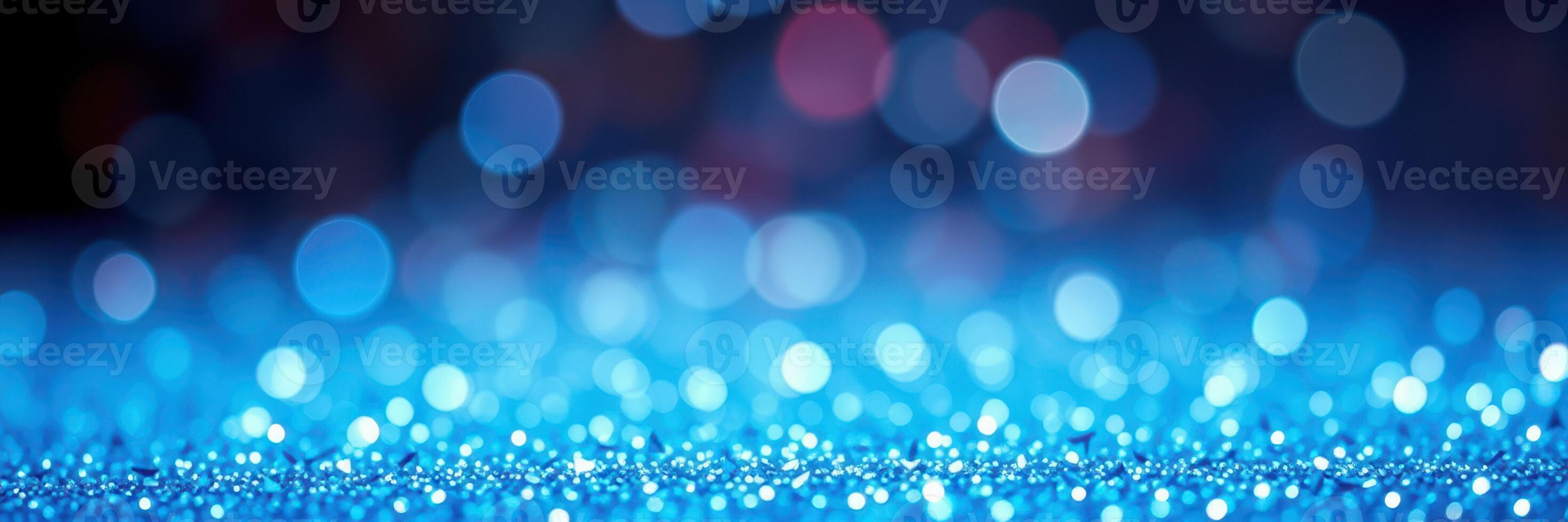 Sparkling blue background creates a mesmerizing bokeh effect perfect for festive occasions and artistic projects photo