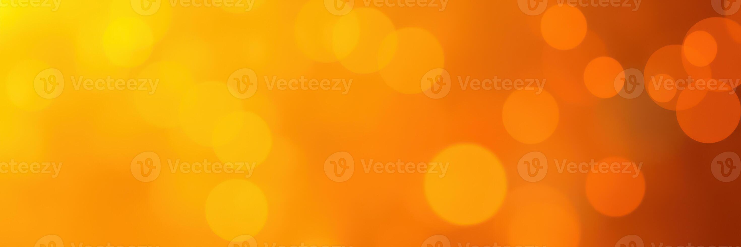Warm orange and yellow bokeh lights create a vibrant and cheerful atmosphere during a sunny afternoon gathering photo