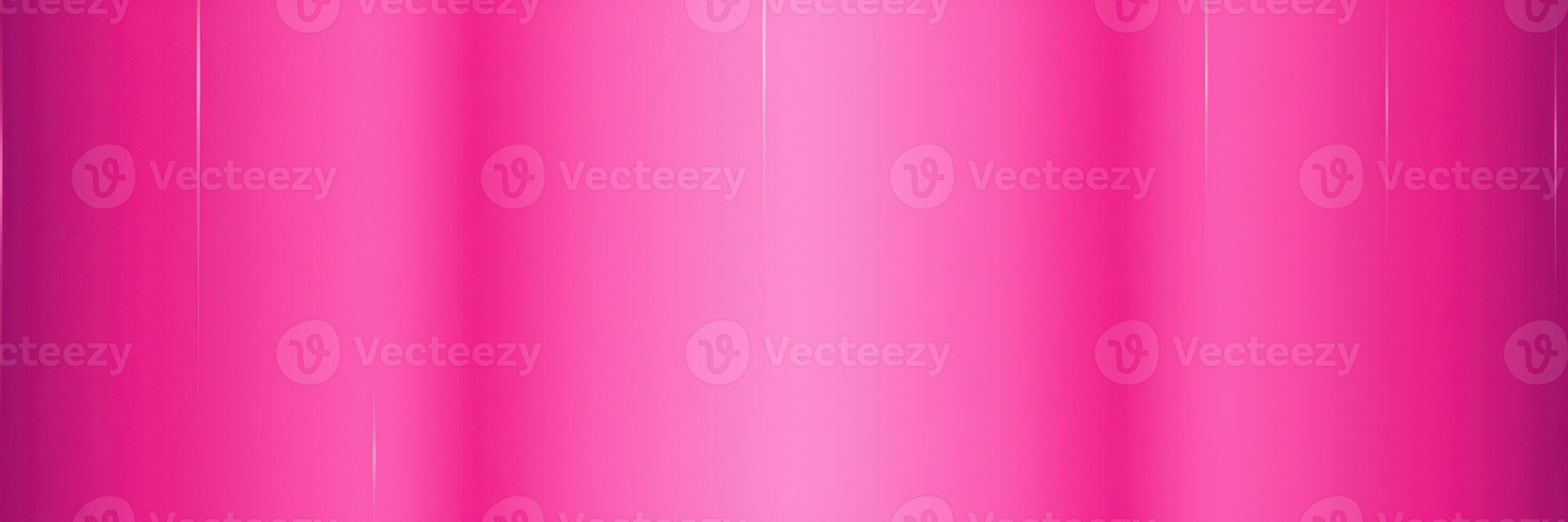 Bright pink background with a smooth texture creating a vibrant and playful atmosphere suitable for design purposes photo