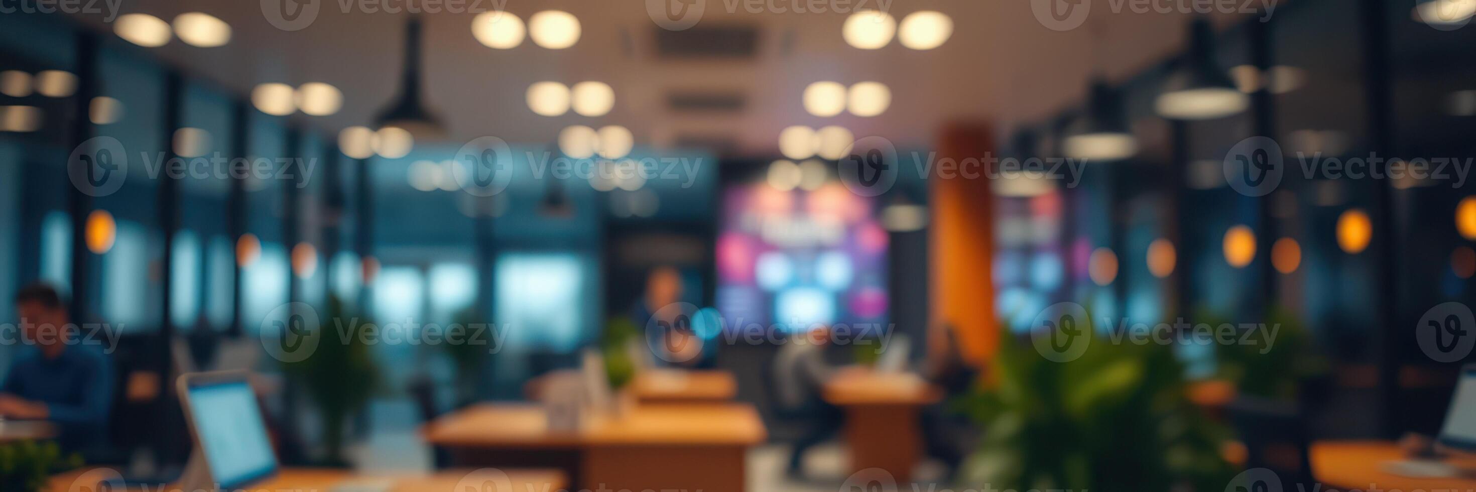 Modern office environment with blurred background and warm lighting creating a productive atmosphere photo