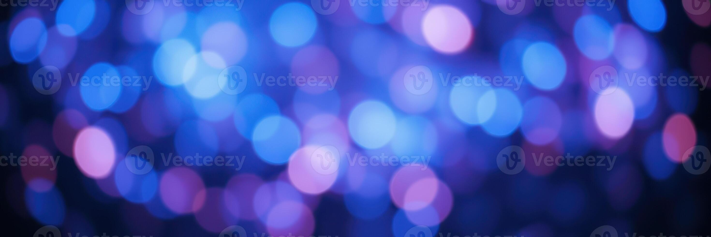 Colorful bokeh lights creating a dreamy atmosphere in a nighttime setting photo