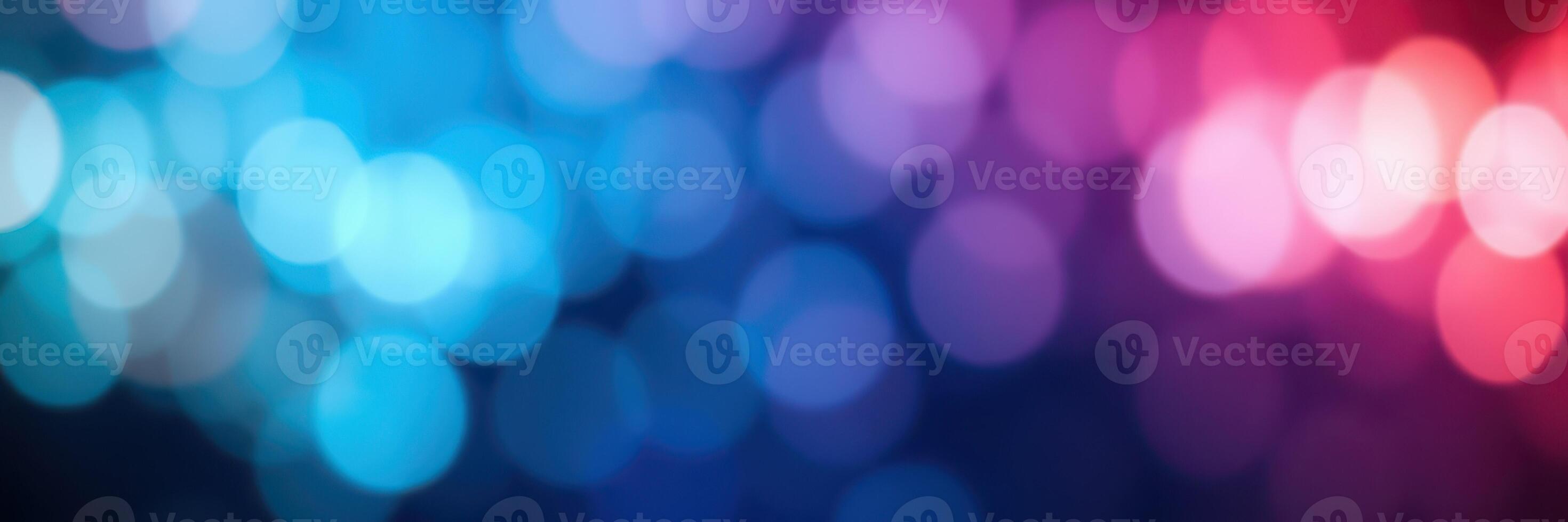 Colorful bokeh lights create an enchanting atmosphere in an urban setting during a nighttime event photo